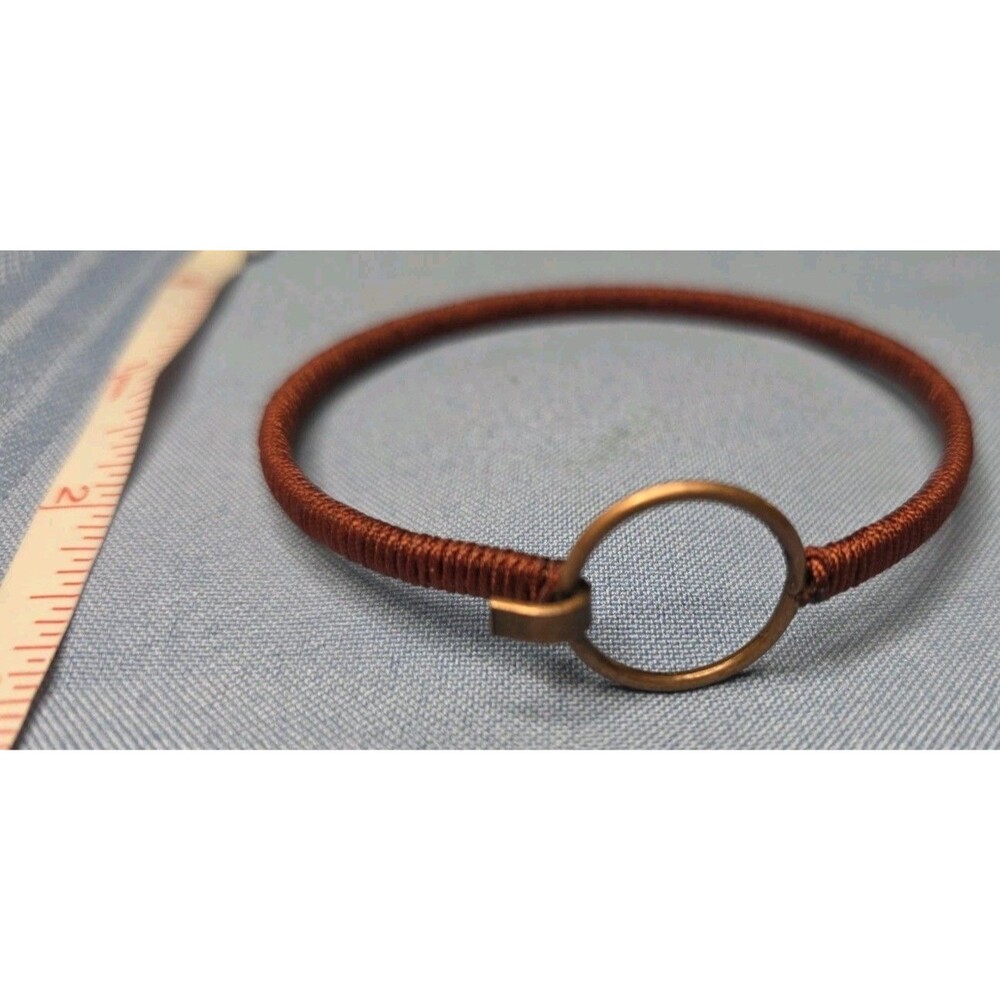 Copper Tone Wrapped Bangle Bracelet with Circle Accent